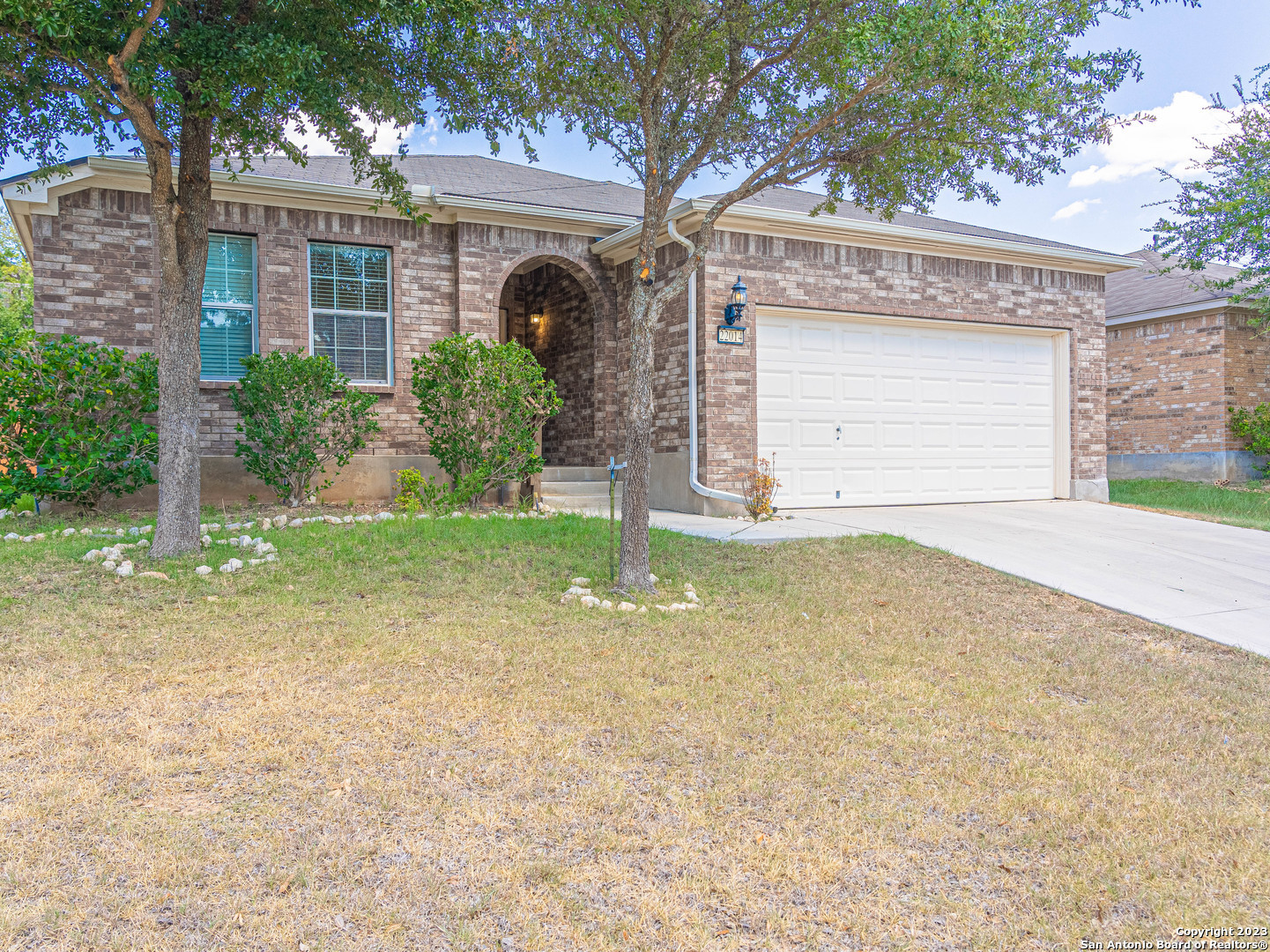 22014 Ruby Run San Antonio, TX 78259 - Photo 1 of 1 a front view of a house with a yard and garage