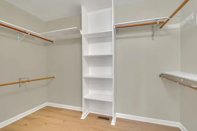 a view of an empty walk in closet