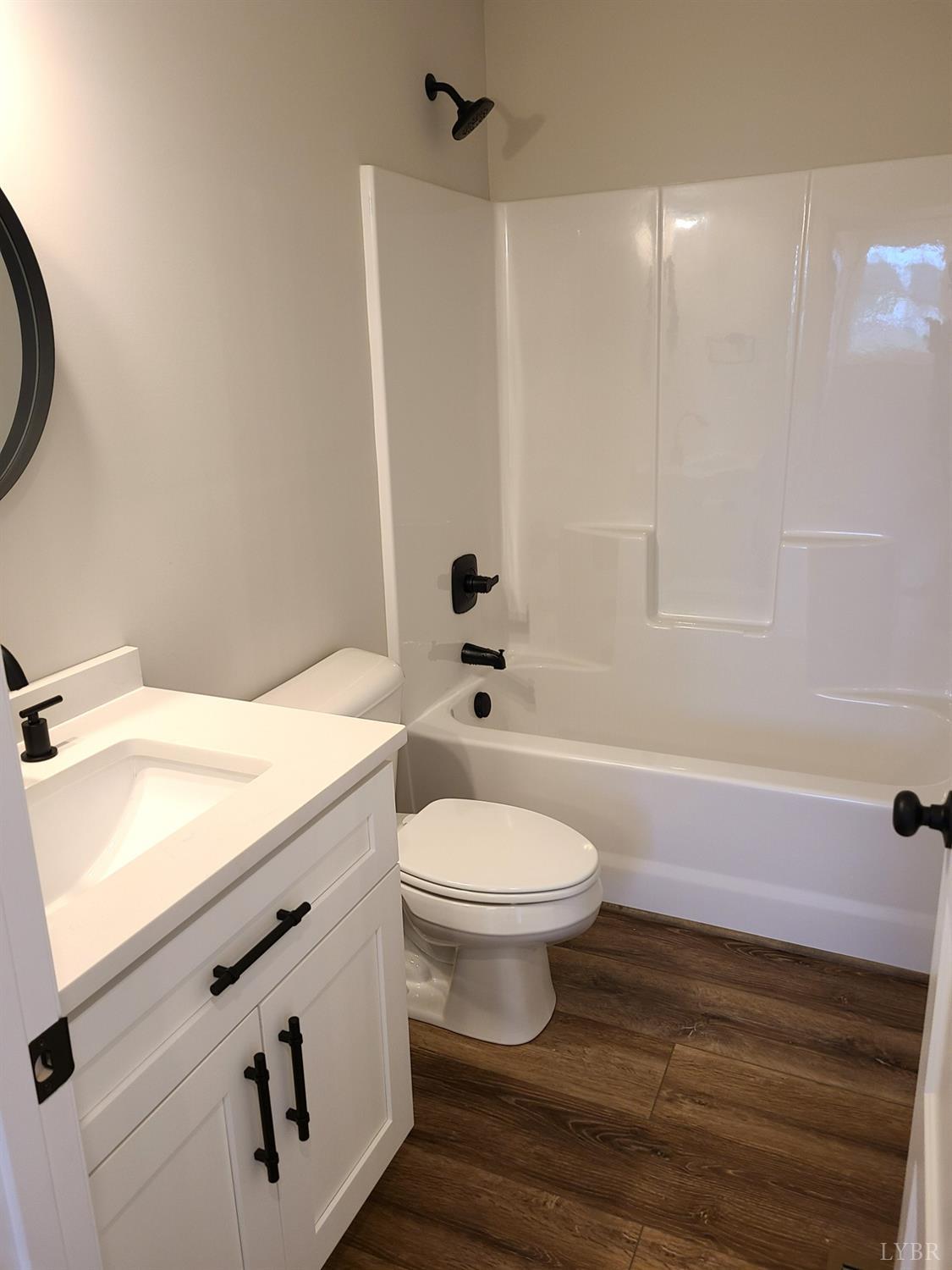 3353 Stonewall Road Concord, VA 24538 - Photo 8 of 21 a bathroom with a sink a toilet and shower