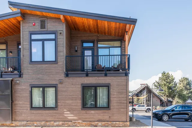 a front view of a house with parking