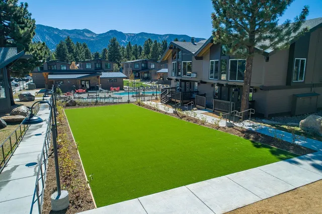an aerial view of a house with a garden