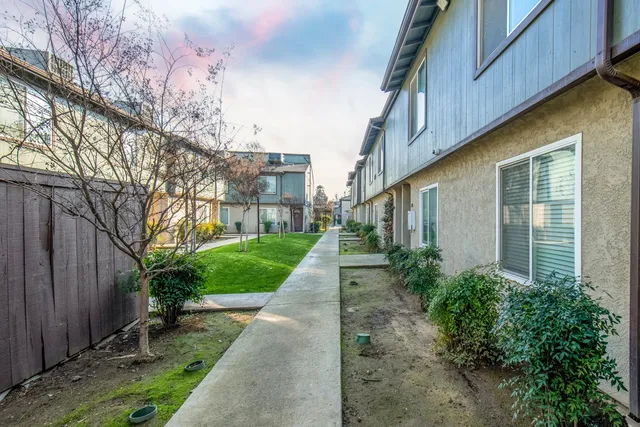 a view of a pathway with a house