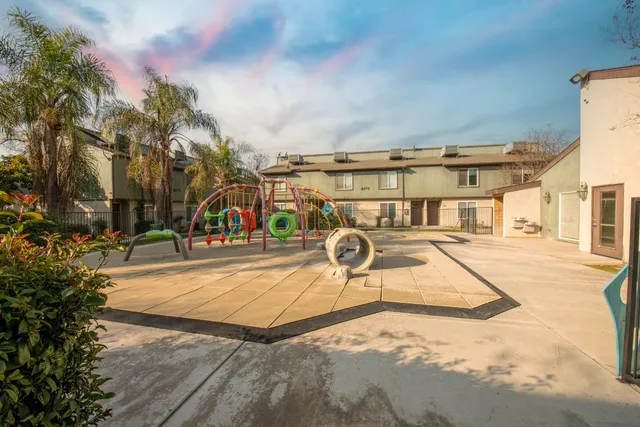 a view of a swimming pool with a slide