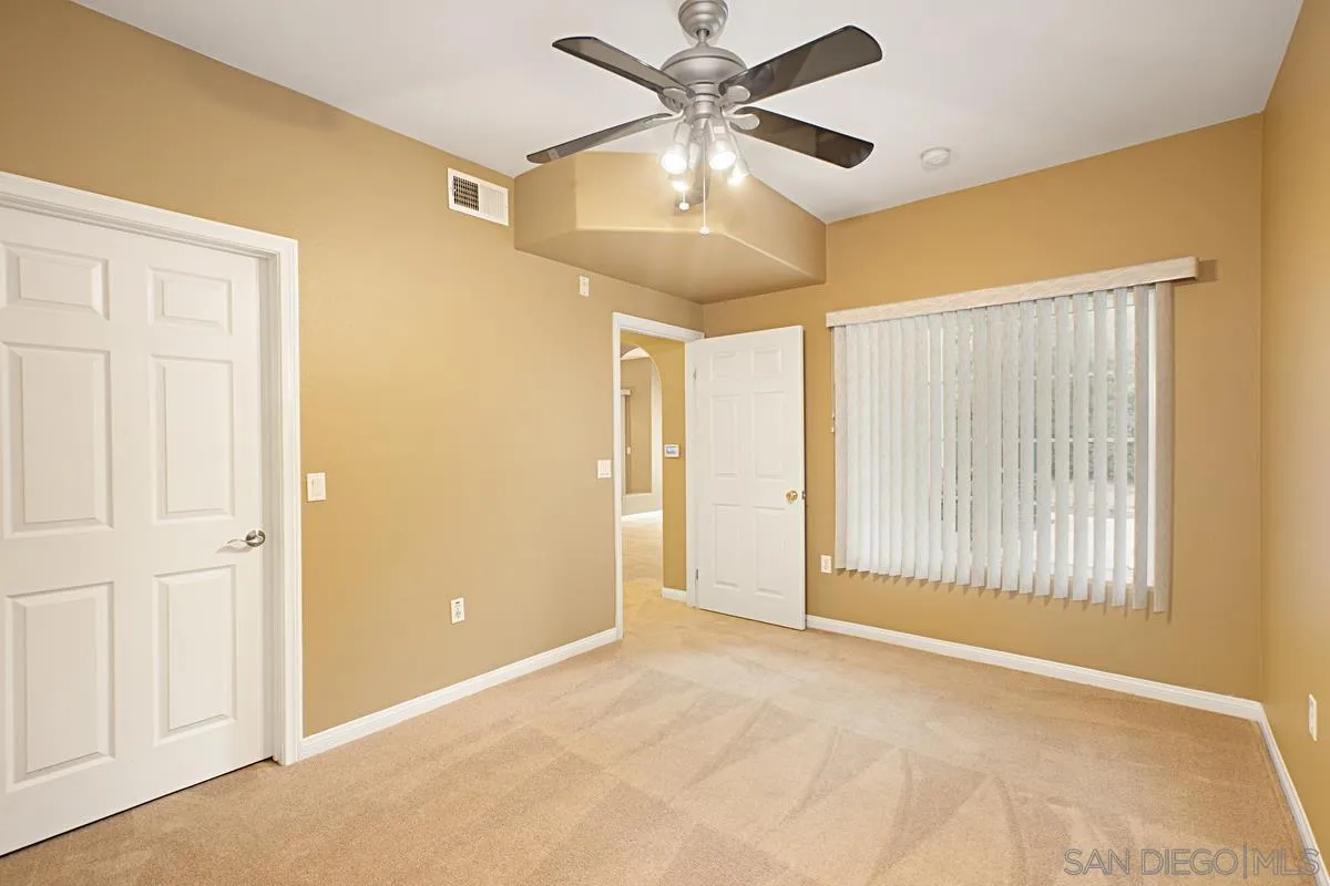 2715 Lake Pointe Drive, Unit 121 Spring Valley, CA 91977 - Photo 18 of 27 a view of an empty room with a window