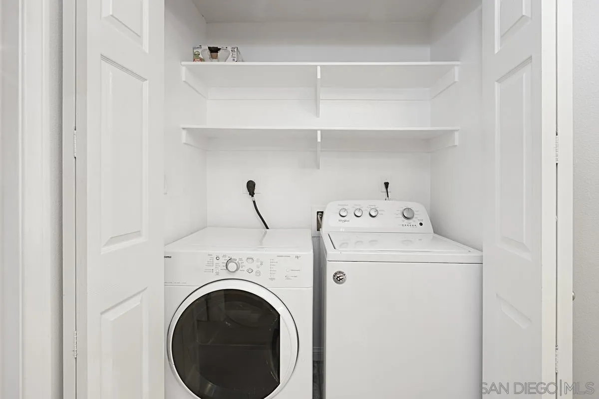 2715 Lake Pointe Drive, Unit 121 Spring Valley, CA 91977 - Photo 21 of 27 a utility room with dryer and washer
