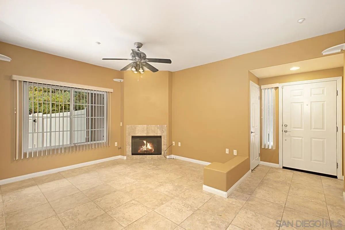 2715 Lake Pointe Drive, Unit 121 Spring Valley, CA 91977 - Photo 4 of 27 a view of an empty room with a fireplace