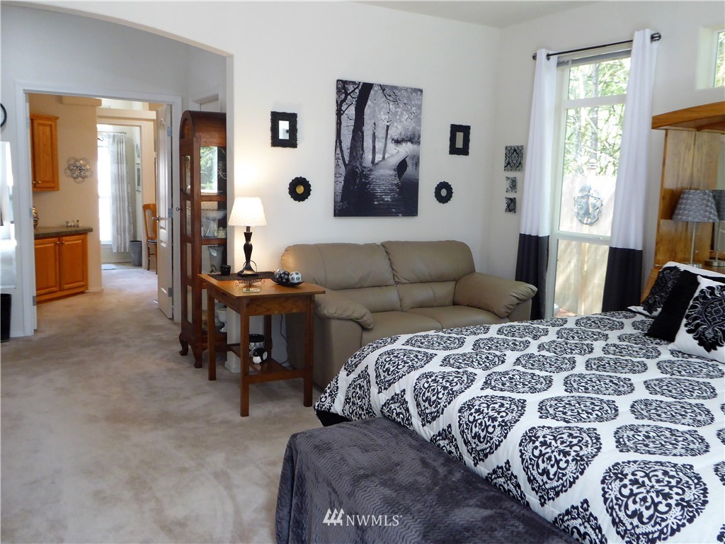137 Smith Road Centralia, WA 98531 - Photo 24 of 39 a bedroom with a bed and a couch