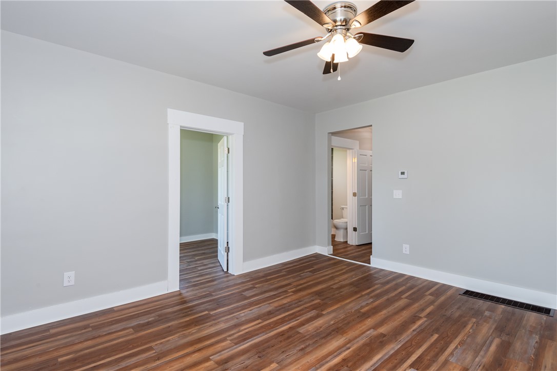 1217 Jasper Road Xenia, OH 45385 - Photo 30 of 62 This interior space features durable flooring, an inviting ambiance, and convenient ceiling fan for comfort.