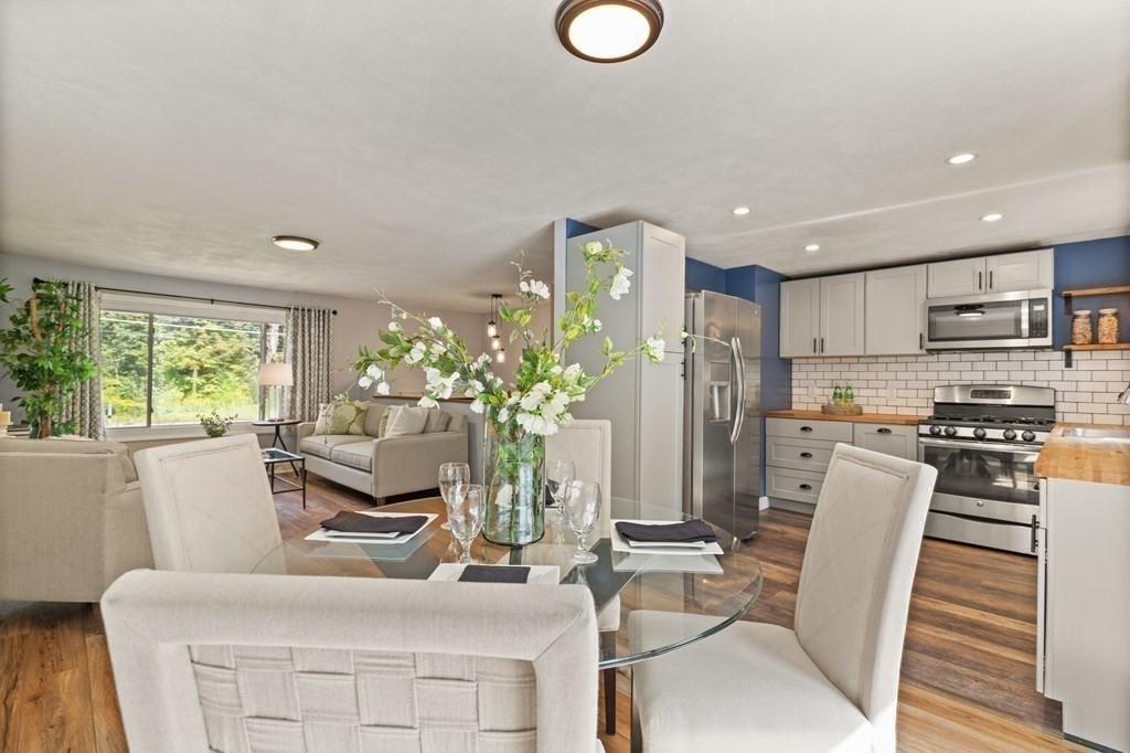 3 Proctor Road Townsend, MA 01469 - Photo 4 of 19 a dining room with furniture and a large window