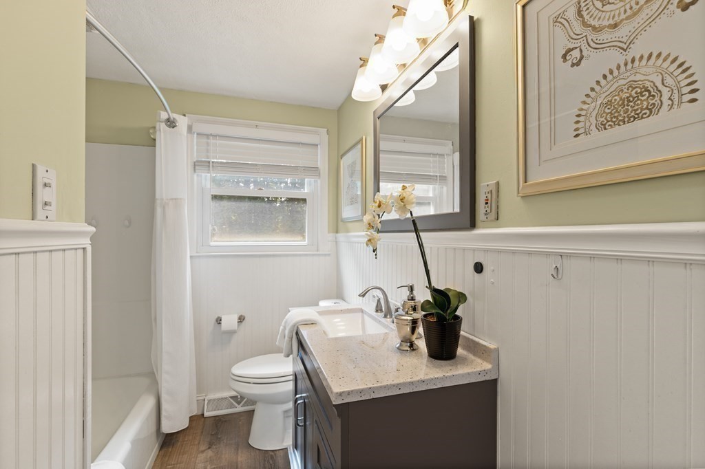 3 Proctor Road Townsend, MA 01469 - Photo 10 of 19 a bathroom with a toilet a sink and mirror