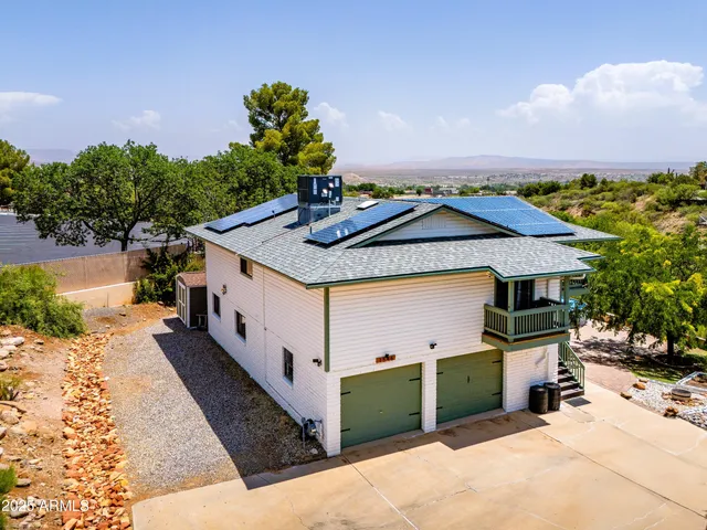 a view of a terrace with a garden