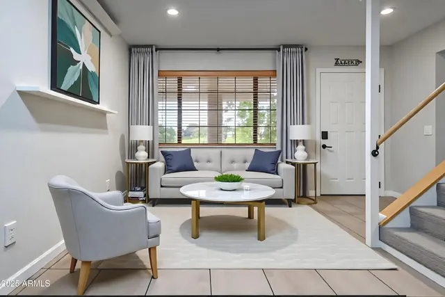 a living room with furniture and a window