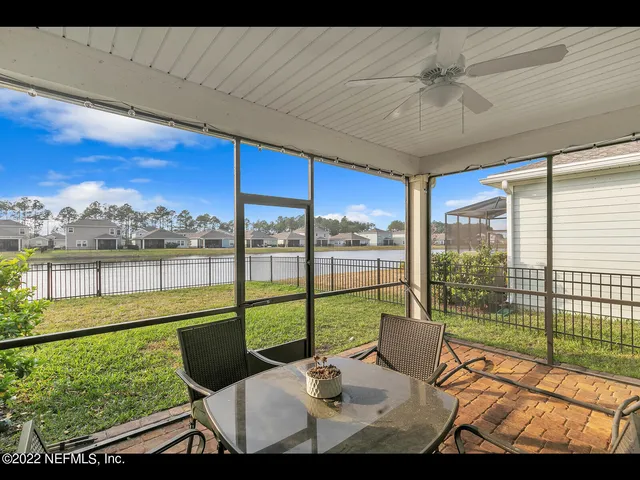 a view of a floor to ceiling window in an outdoor space