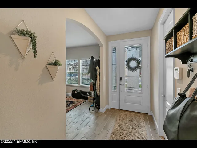 a view of livingroom with furniture and windows