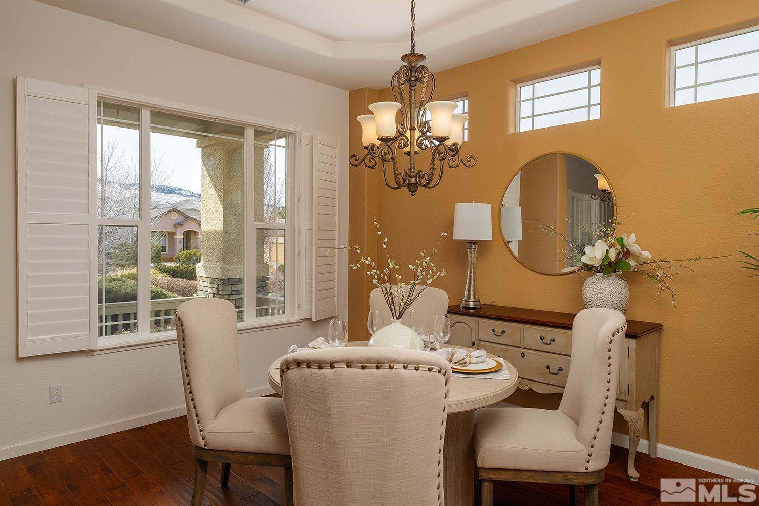 7340 Tempe Court Reno, NV 89511 - Photo 16 of 38 a view of a dining room with furniture window and outside view