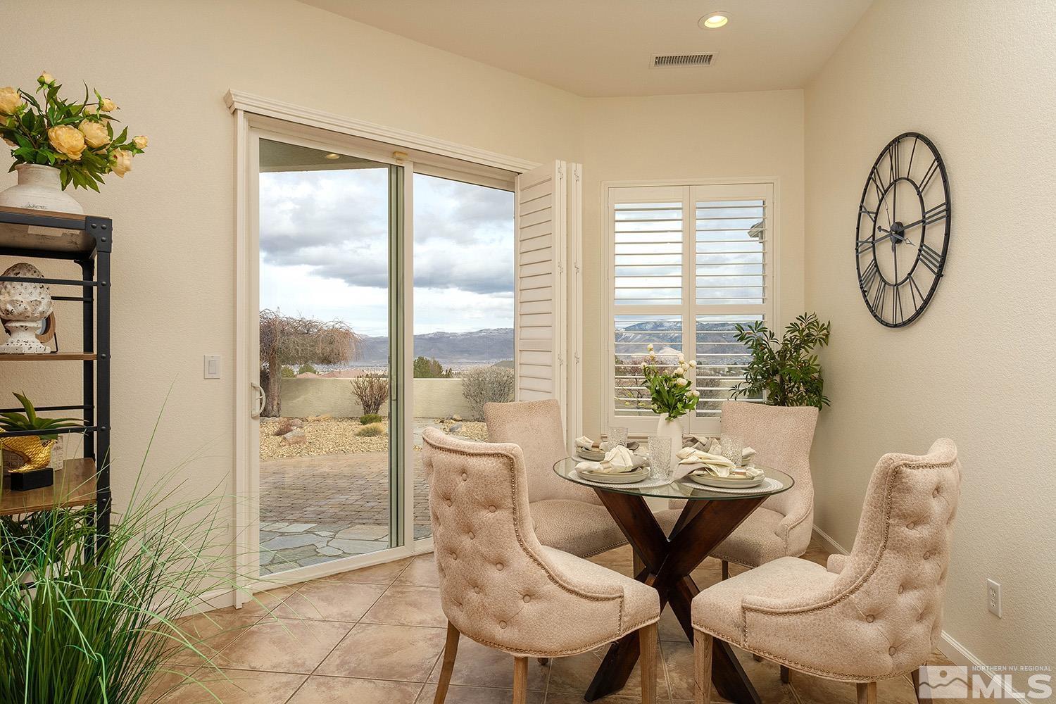 7340 Tempe Court Reno, NV 89511 - Photo 8 of 38 a view of a dining room with furniture window and outside view