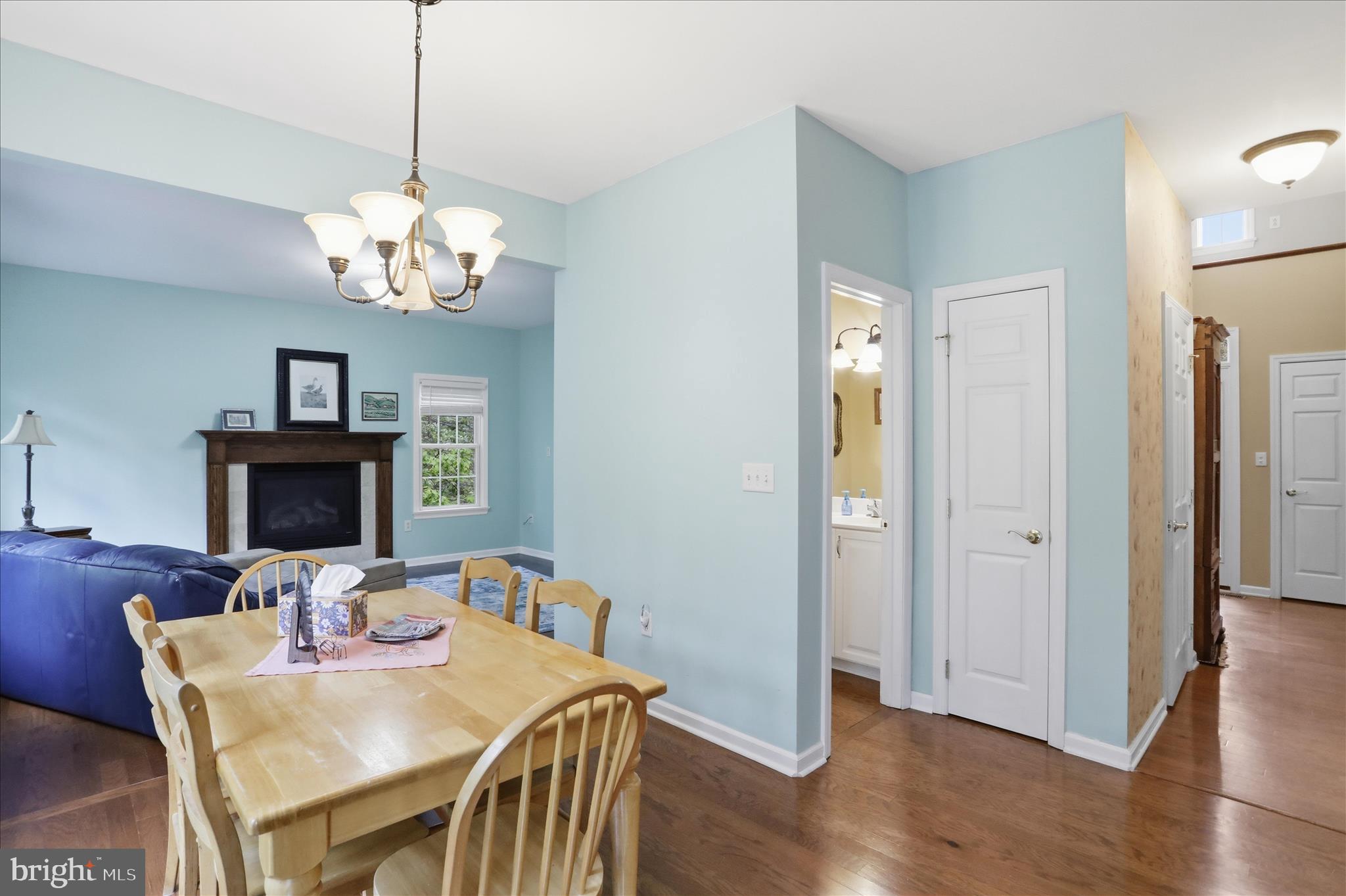 1175 North Lakewood Drive Ridgeley, WV 26753 - Photo 11 of 33 a view of a dining room with furniture wooden floor and chandelier