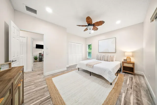 a view of a bathroom from the hallway