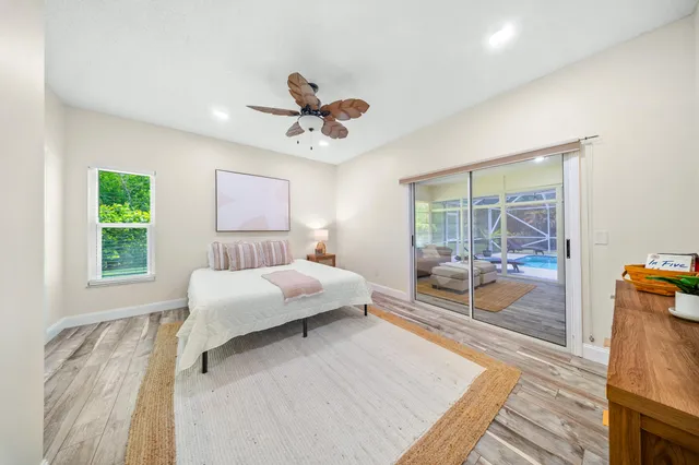 a bathroom with a shower toilet and sink