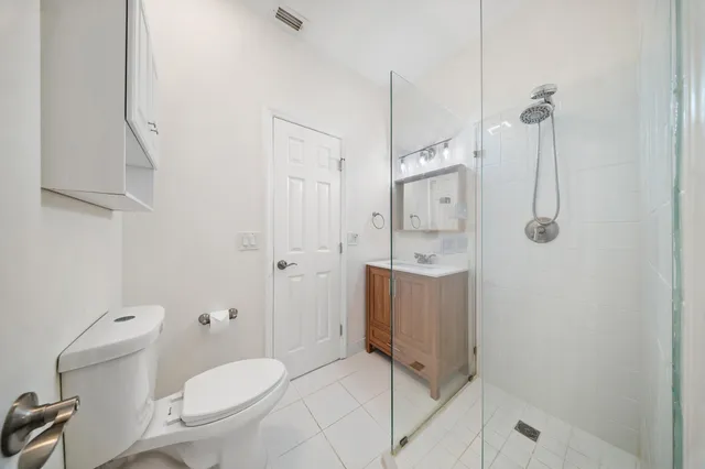 a view of a swimming pool with a porch