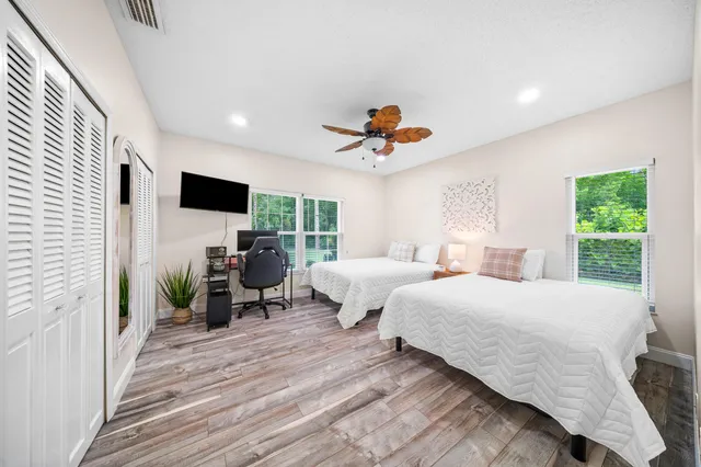 a view of a swimming pool with a patio