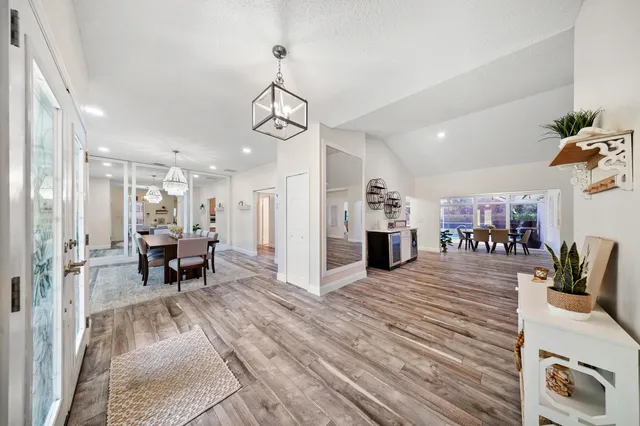 a view of a living room and dining room