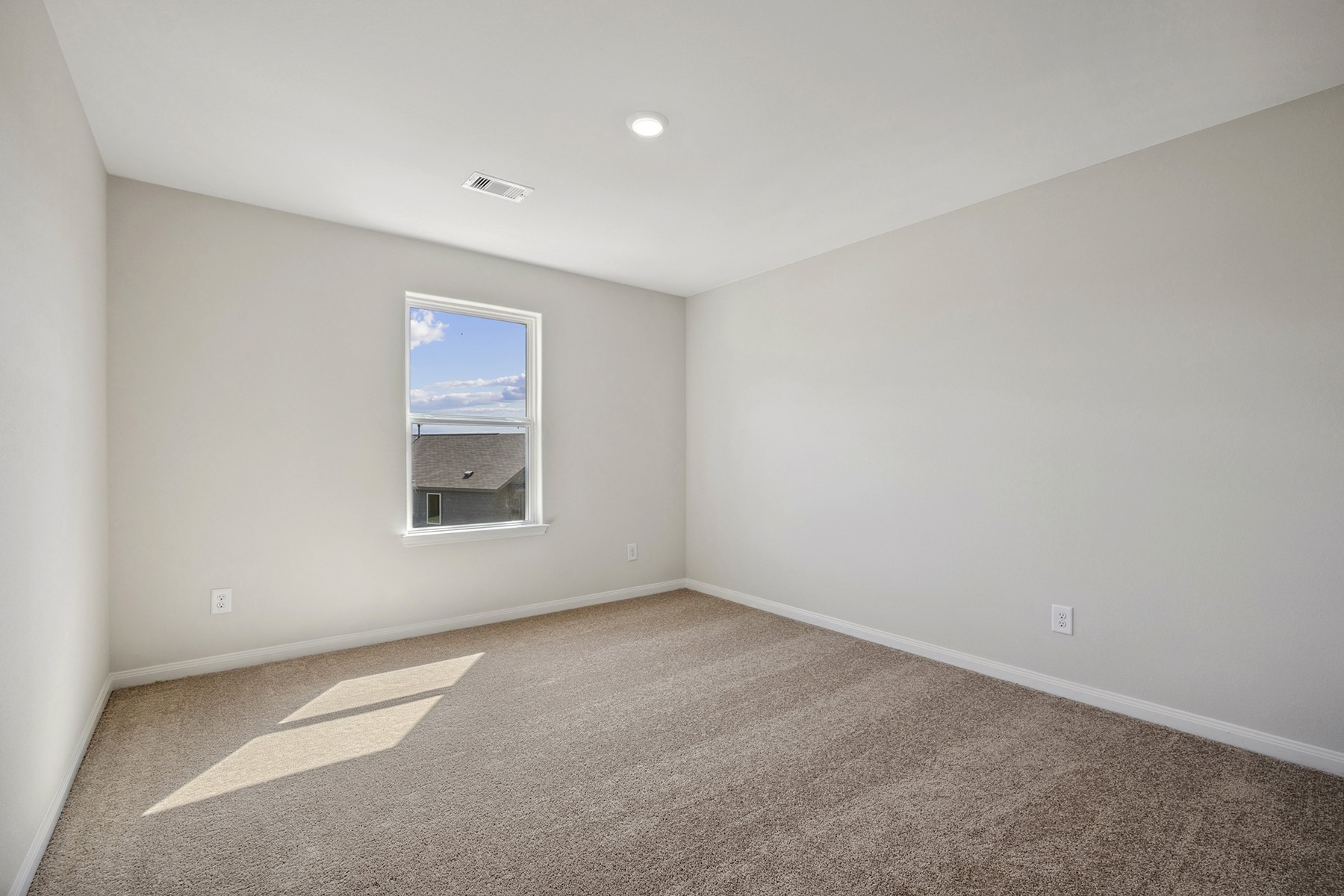 360 Kingston Way Waller, TX 77484 - Photo 18 of 21 an empty room with a window