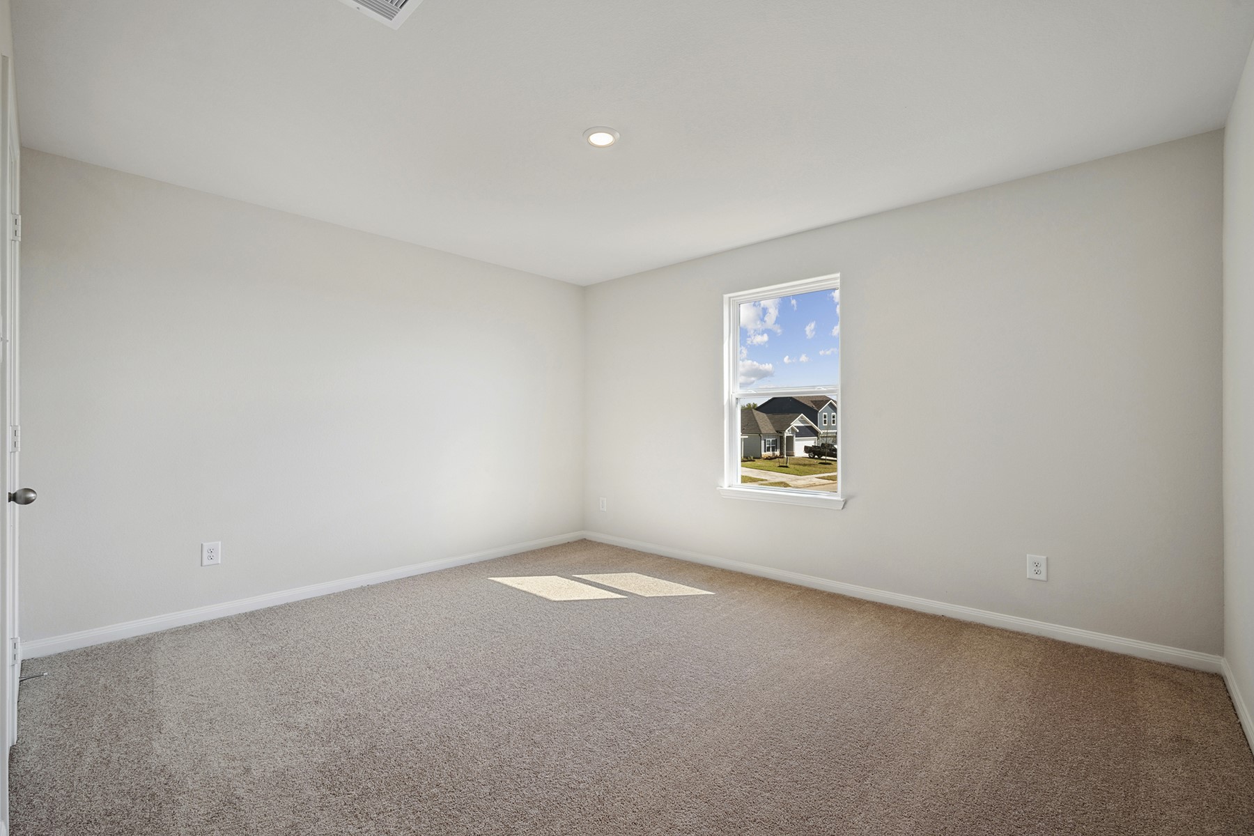 360 Kingston Way Waller, TX 77484 - Photo 19 of 21 a view of an empty room with a window