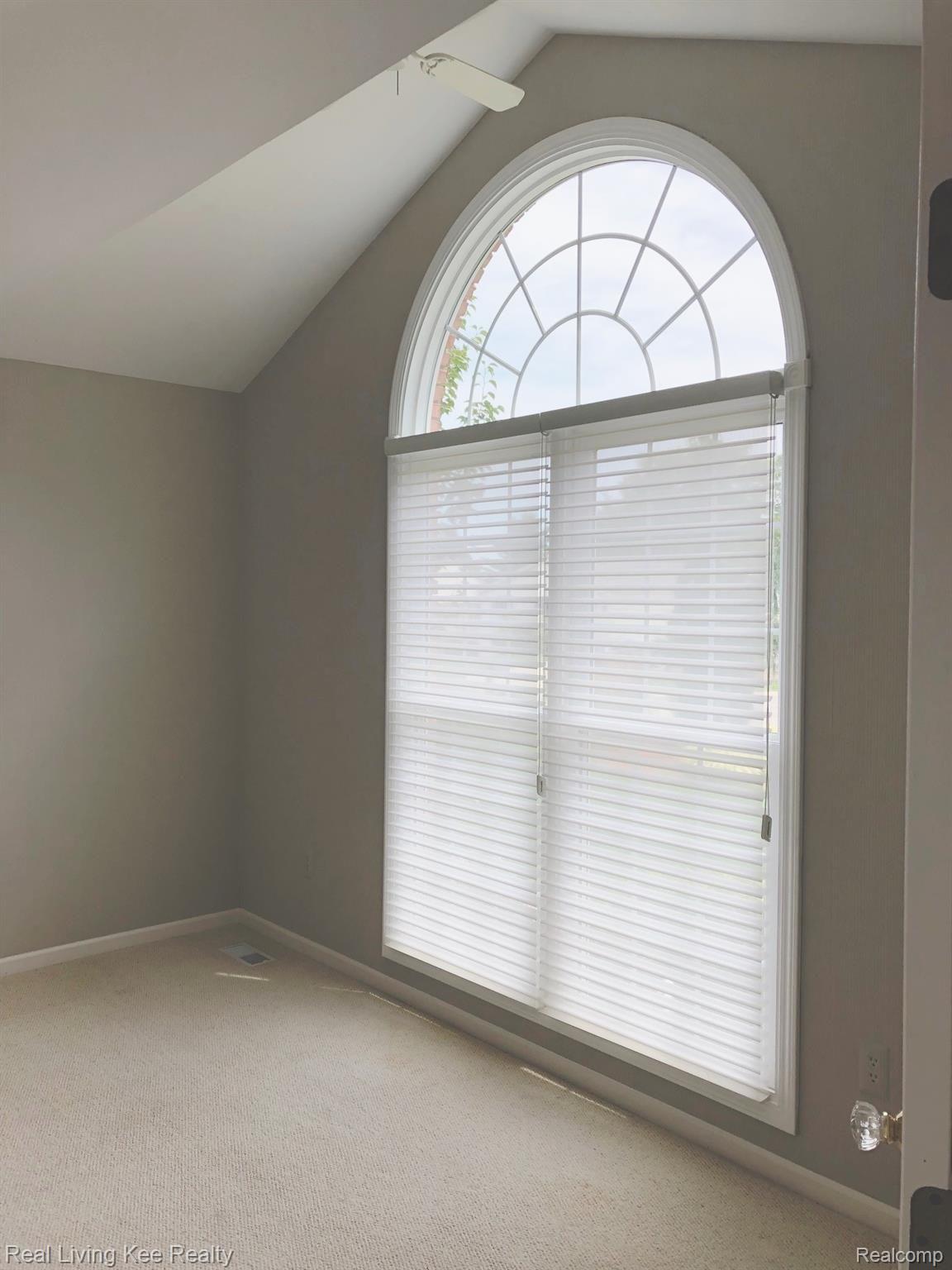 677 Augusta Drive Rochester, MI 48309 - Photo 6 of 38 Den with dramatic ceiling detail and tall window.