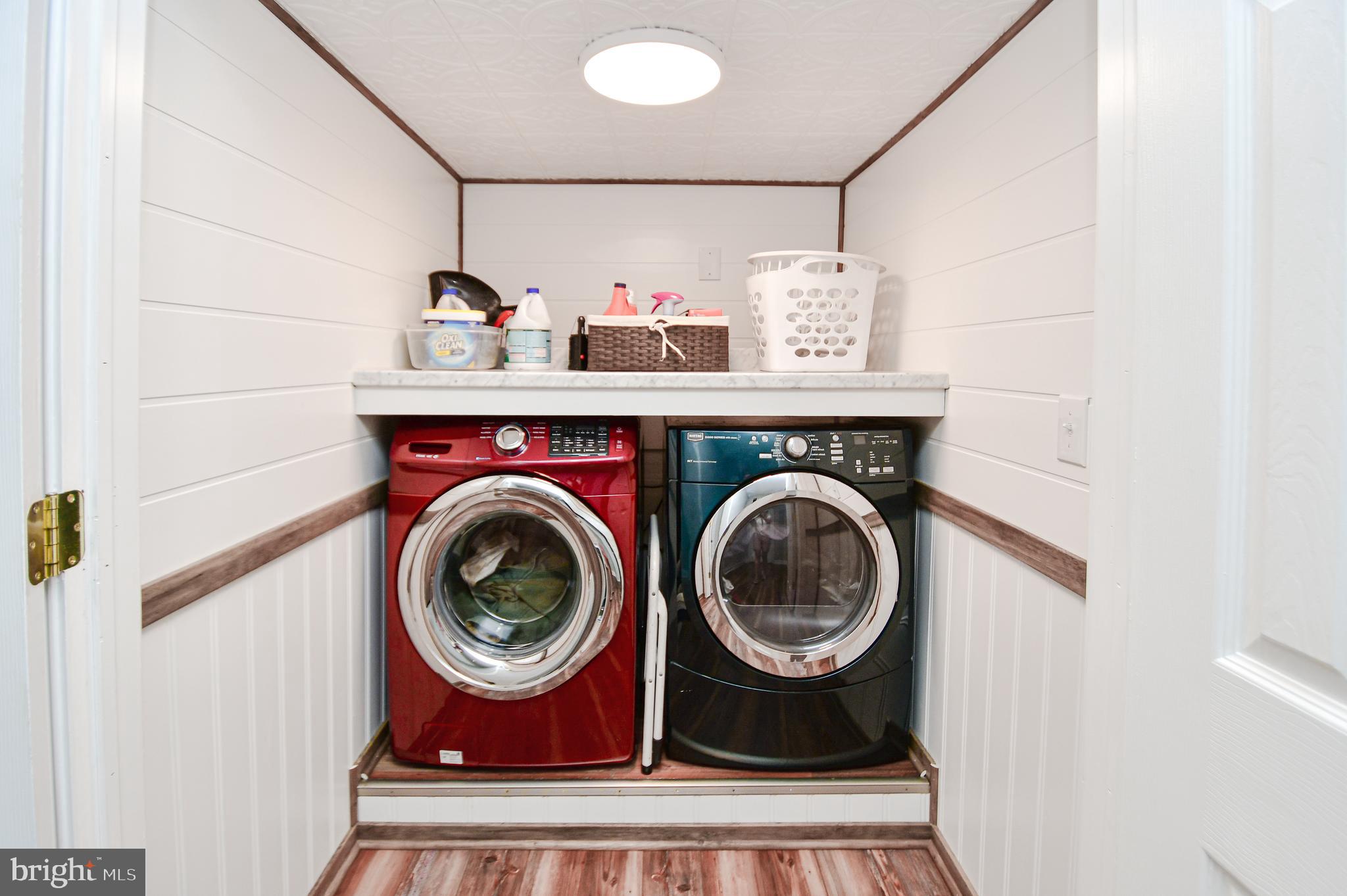 5934 Conover Road Taneytown, MD 21787 - Photo 13 of 38 a utility room with dryer and washer