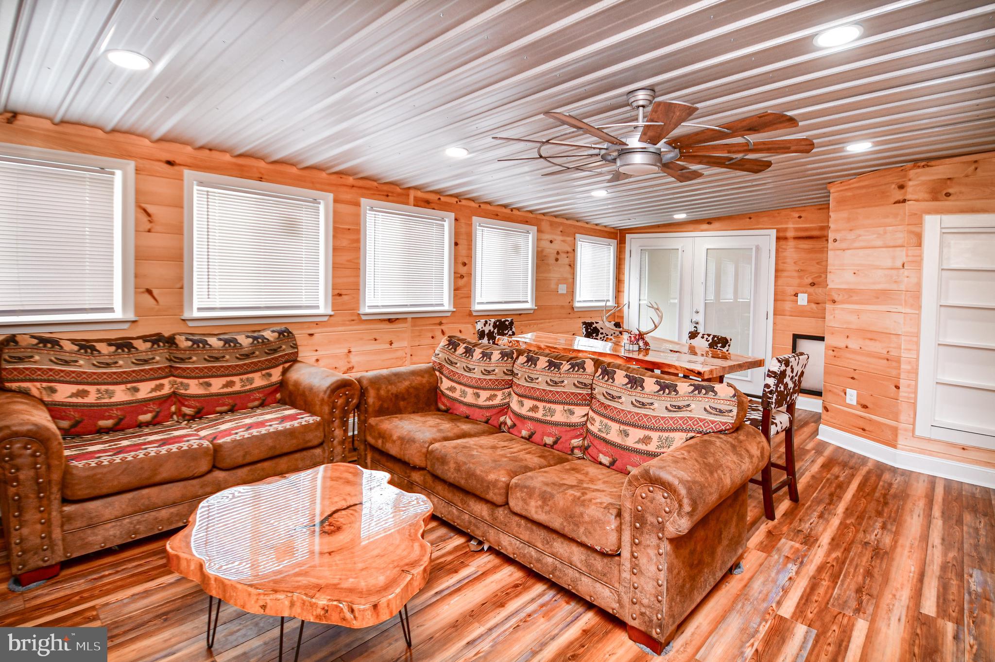 5934 Conover Road Taneytown, MD 21787 - Photo 15 of 38 a living room with furniture and a large window