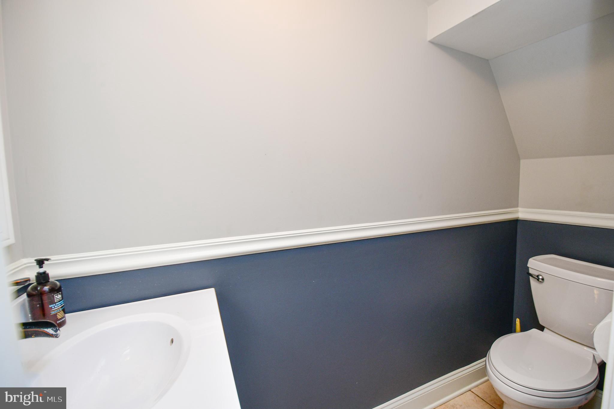 5934 Conover Road Taneytown, MD 21787 - Photo 16 of 38 a white toilet sitting next to a white sink