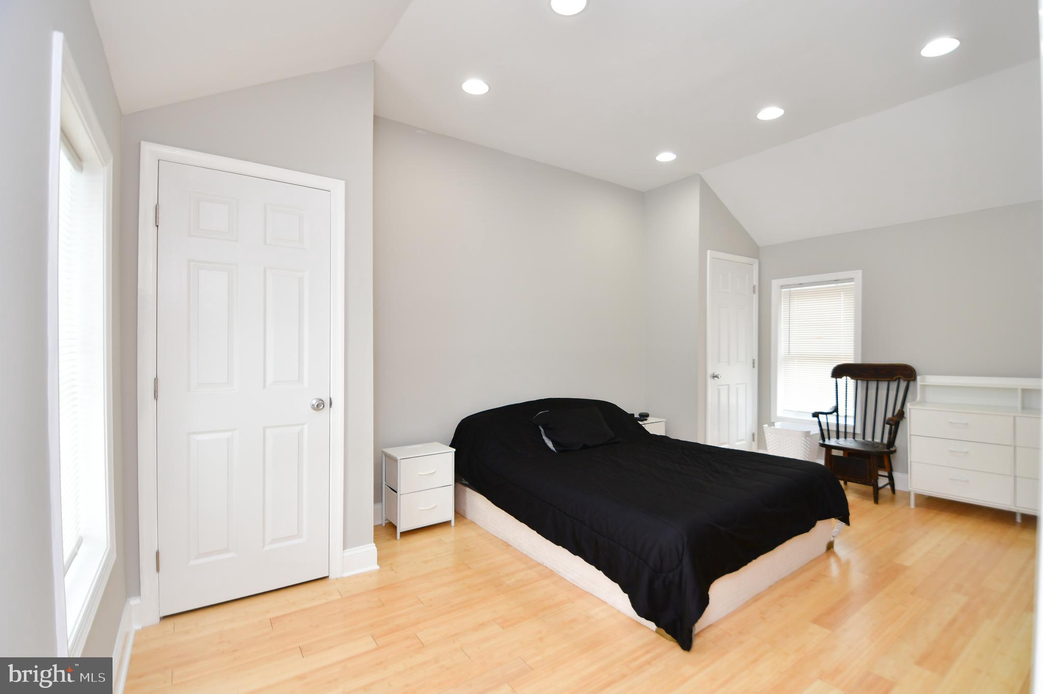 5934 Conover Road Taneytown, MD 21787 - Photo 17 of 38 a bedroom with a bed and wooden floor