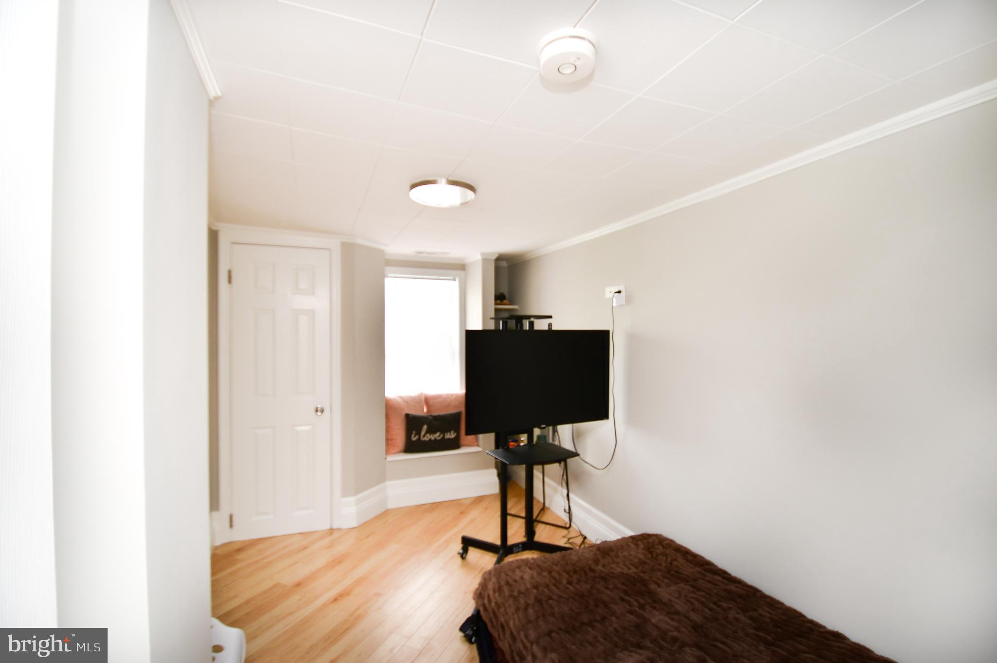 5934 Conover Road Taneytown, MD 21787 - Photo 20 of 38 a view of a workspace with furniture and a window