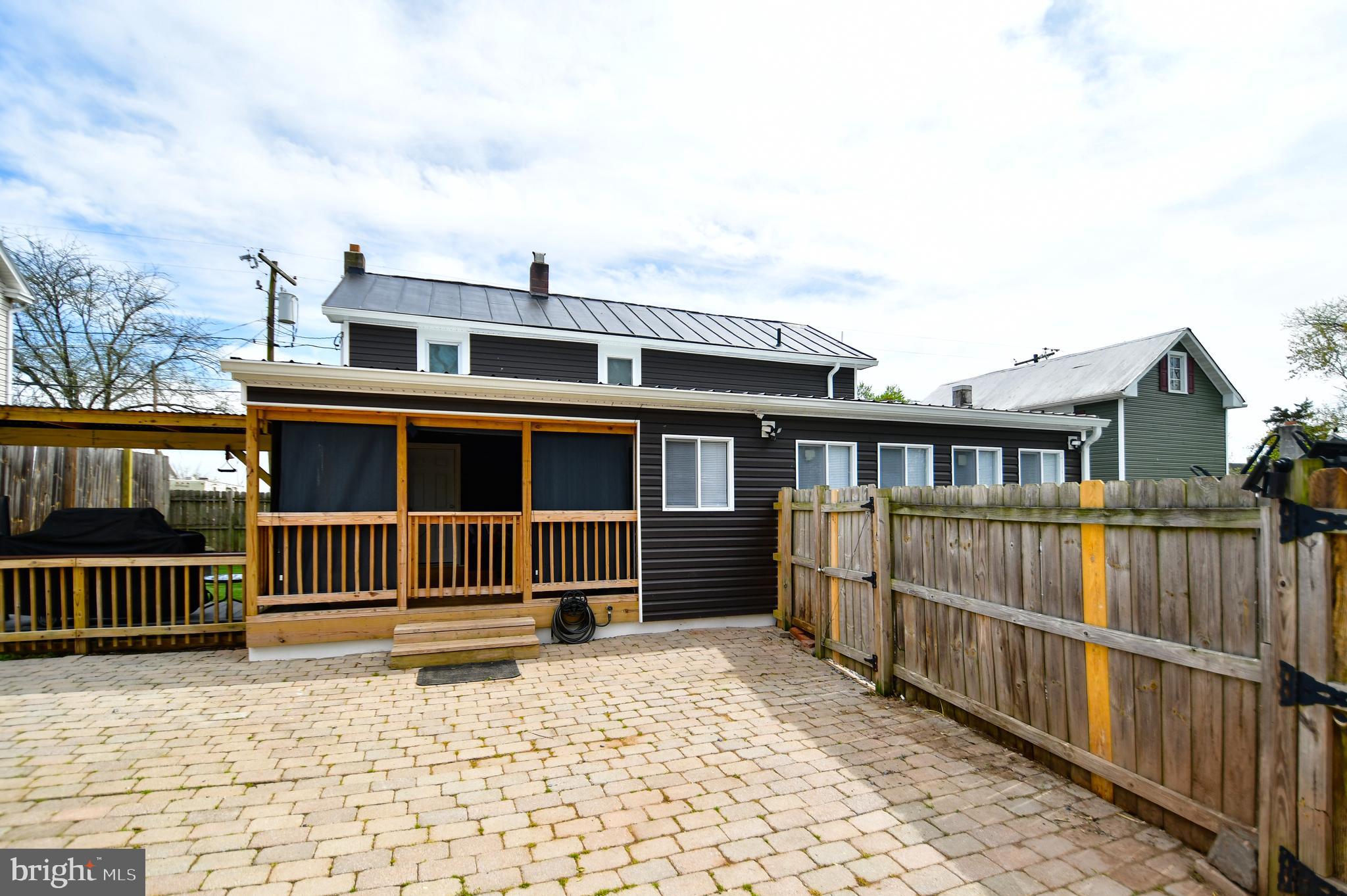 5934 Conover Road Taneytown, MD 21787 - Photo 33 of 38 a front view of a house with a yard
