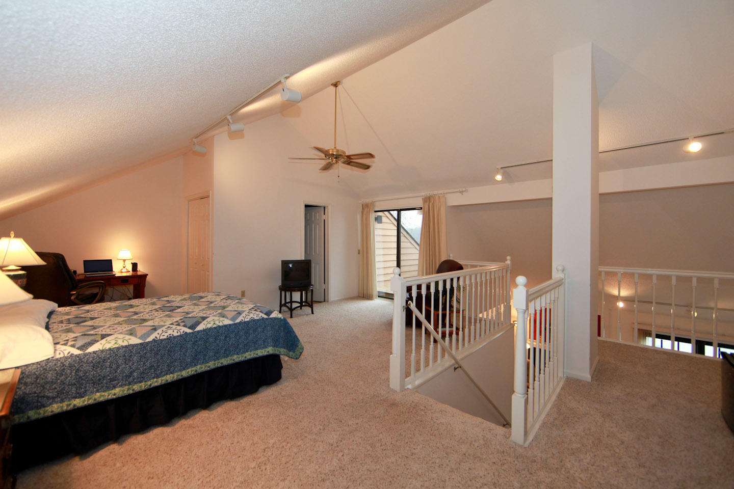 645 Monte Vista Road, Unit 103 Union Hall, VA 24176 - Photo 18 of 32 a bedroom with a bed and a chandelier