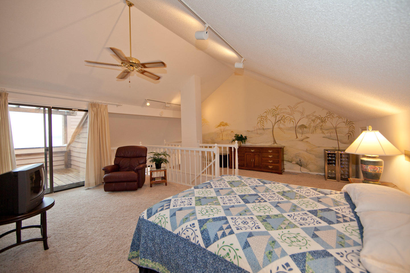 645 Monte Vista Road, Unit 103 Union Hall, VA 24176 - Photo 19 of 32 a living room with furniture and a chandelier