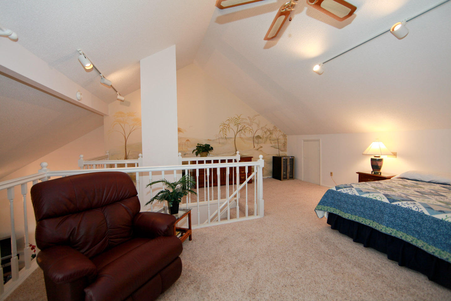 645 Monte Vista Road, Unit 103 Union Hall, VA 24176 - Photo 20 of 32 a living room with furniture a rug and a chandelier