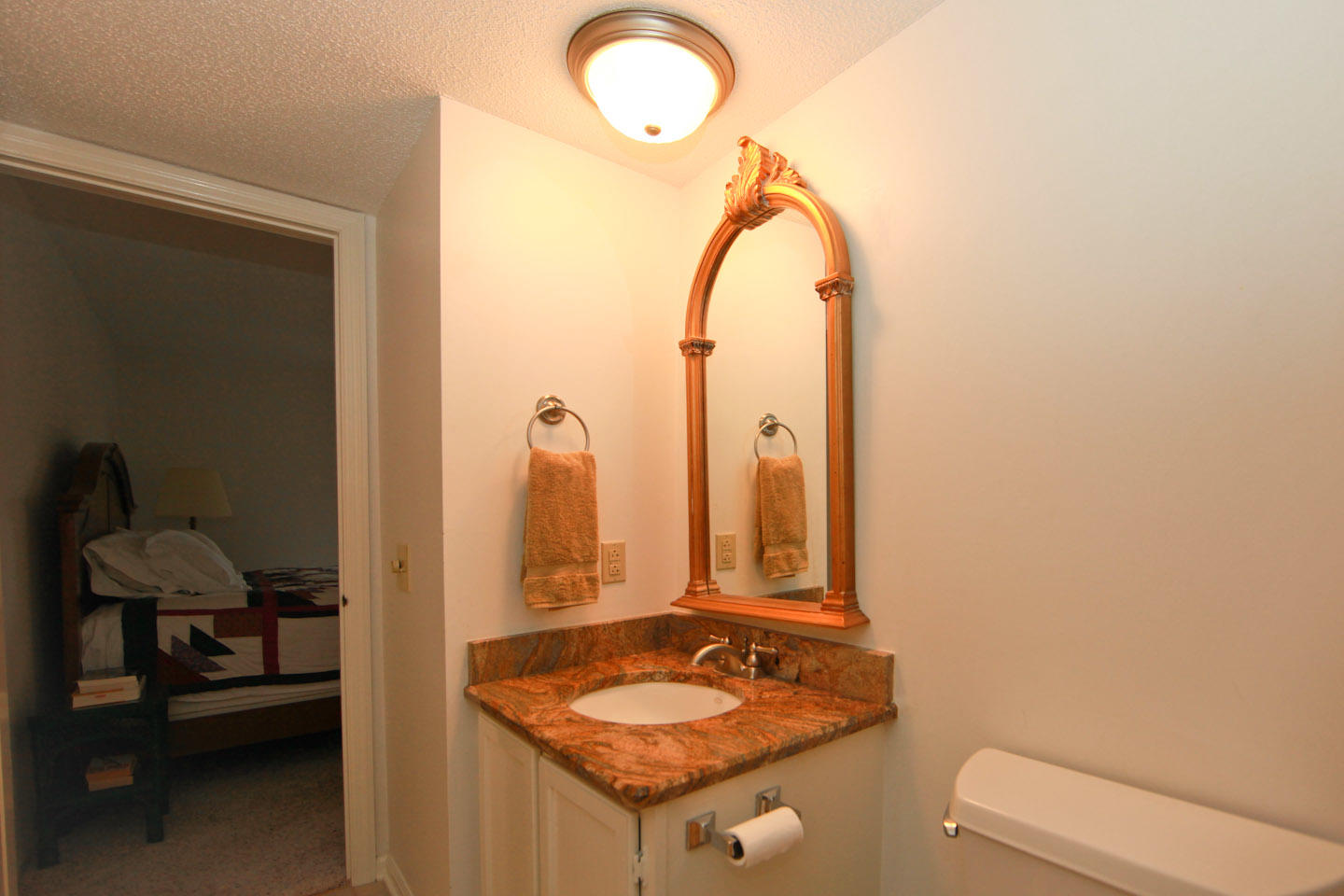 645 Monte Vista Road, Unit 103 Union Hall, VA 24176 - Photo 21 of 32 a bathroom with a granite countertop sink and a mirror