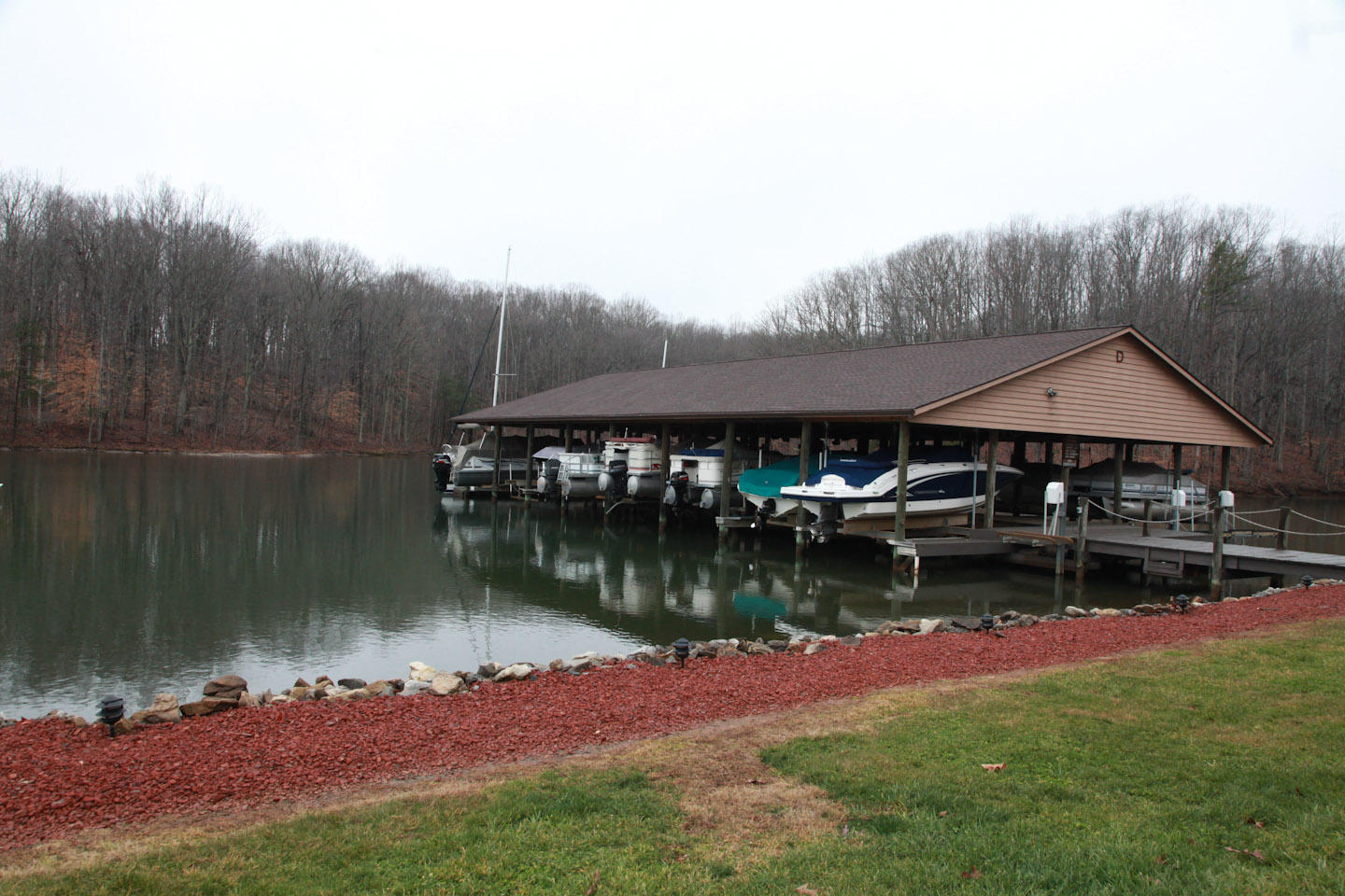645 Monte Vista Road, Unit 103 Union Hall, VA 24176 - Photo 27 of 32 a backyard of a house with yard table and chairs
