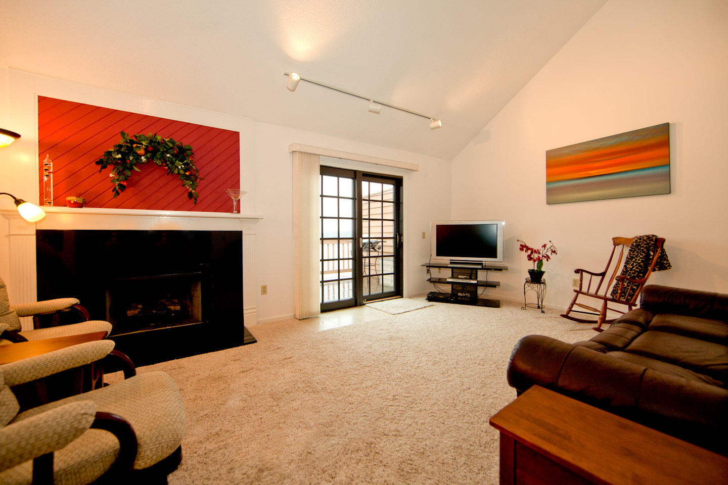 645 Monte Vista Road, Unit 103 Union Hall, VA 24176 - Photo 4 of 32 a living room with furniture a flat screen tv and a fireplace