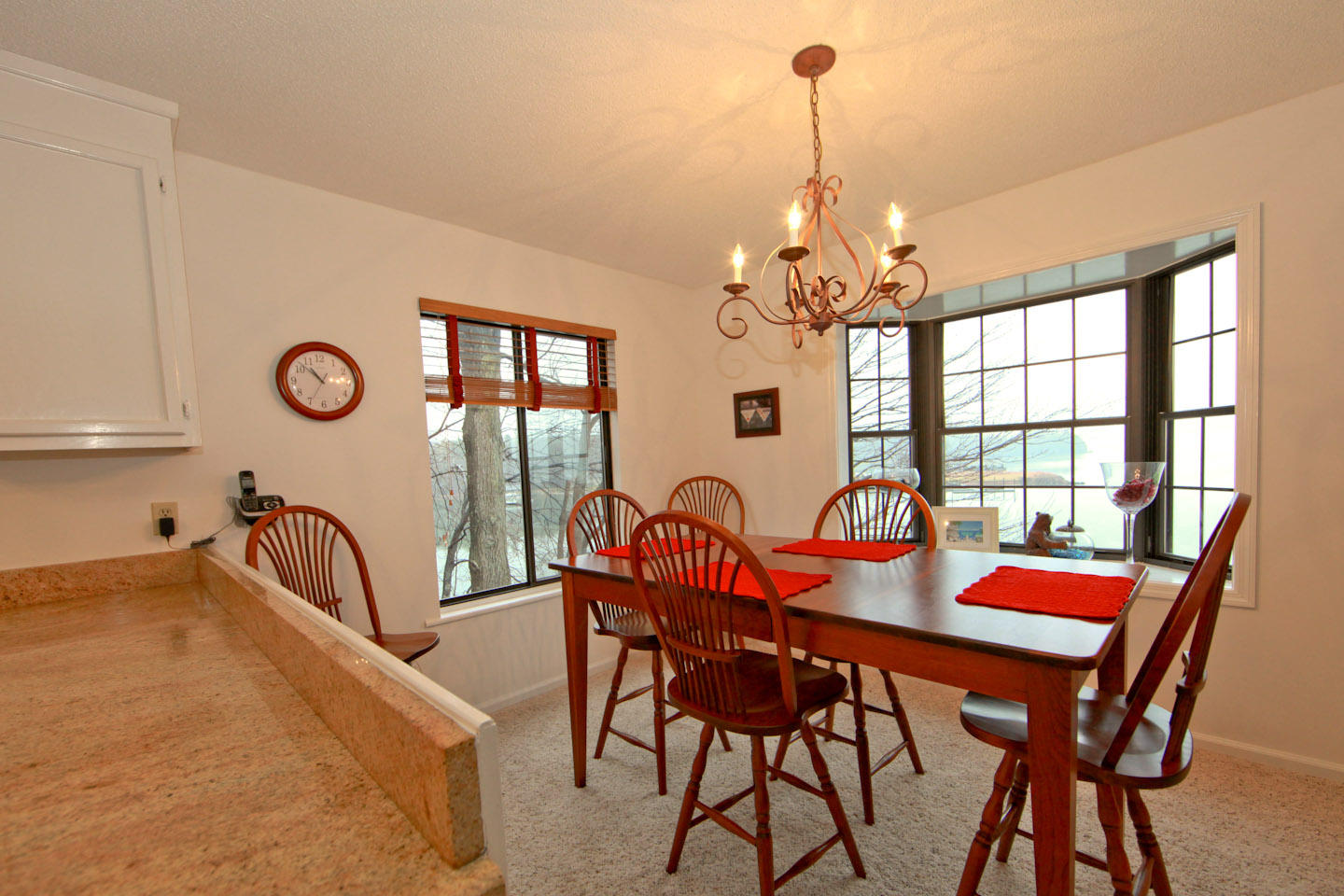 645 Monte Vista Road, Unit 103 Union Hall, VA 24176 - Photo 8 of 32 a dining room with furniture a chandelier and a rug