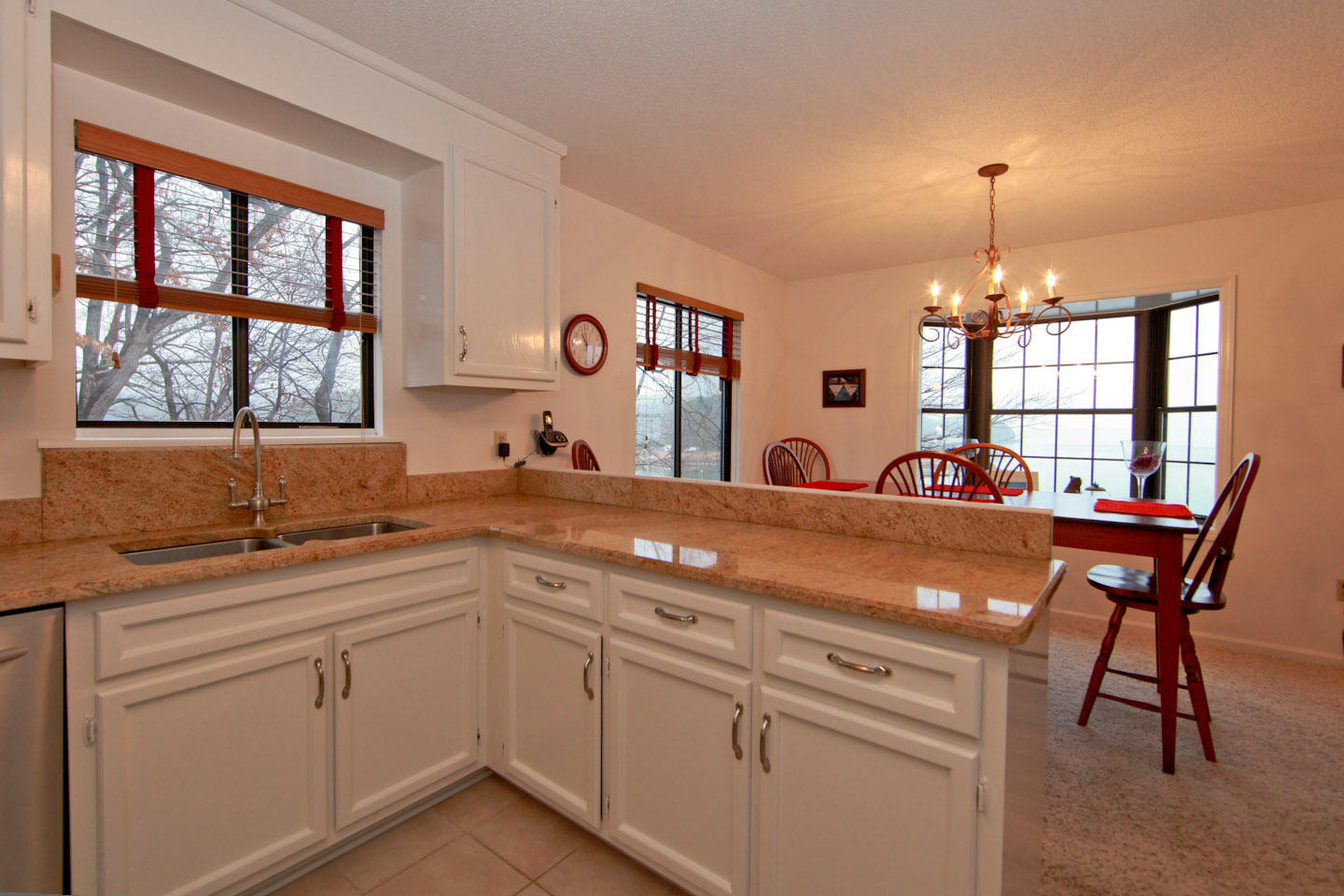 645 Monte Vista Road, Unit 103 Union Hall, VA 24176 - Photo 9 of 32 a open kitchen with a sink dining table and chairs
