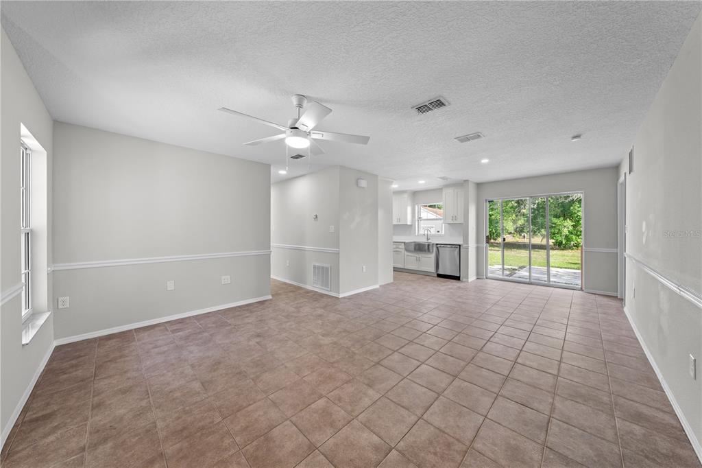 750 West New Nolte Road St. Cloud, FL 34769 - Photo 11 of 59 a view of a kitchen with a sink and a window