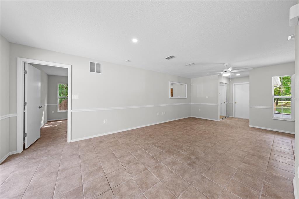 750 West New Nolte Road St. Cloud, FL 34769 - Photo 17 of 59 an empty room with an empty space and windows