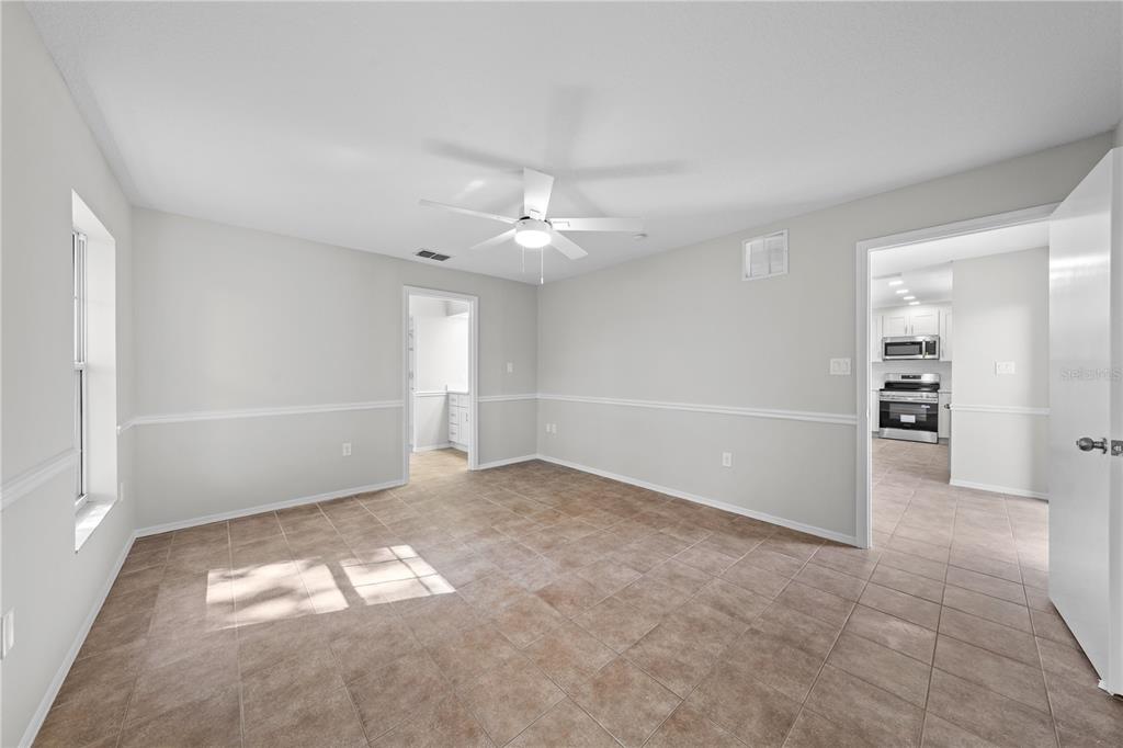 750 West New Nolte Road St. Cloud, FL 34769 - Photo 27 of 59 wooden floor in an empty room