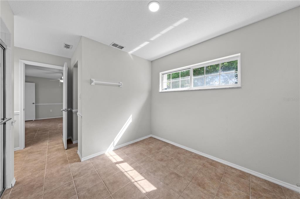 750 West New Nolte Road St. Cloud, FL 34769 - Photo 31 of 59 an empty room with windows and closet
