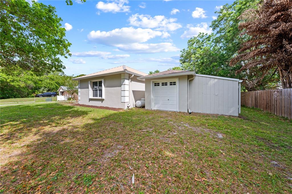 750 West New Nolte Road St. Cloud, FL 34769 - Photo 42 of 59 a view of a house with a yard