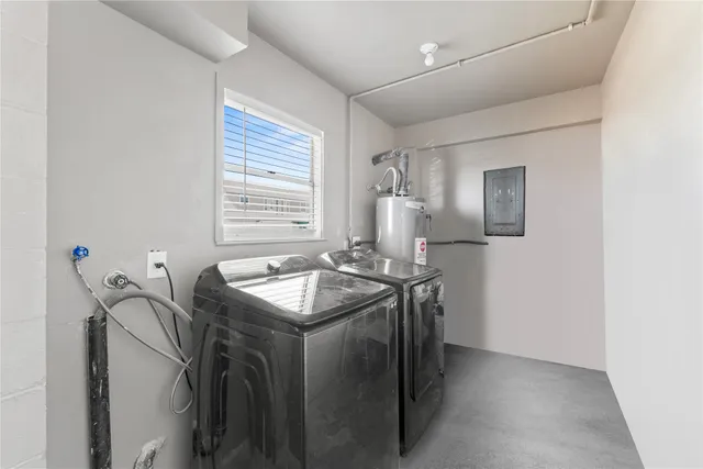 a utility room with dryer and washer