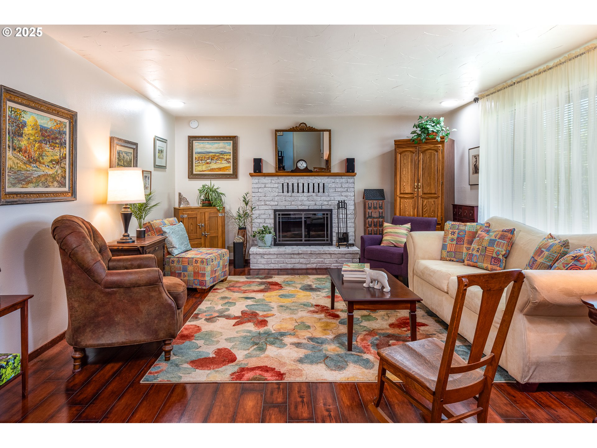633 Rowan Avenue Springfield, OR 97477 - Photo 3 of 47 a living room with furniture and a fireplace